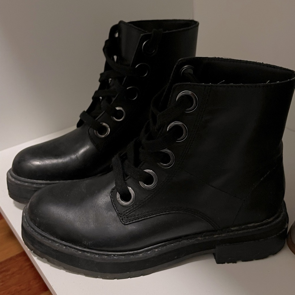 Lace-up black booties